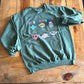 “It’s Okay to Be” Crewneck Military Green Size