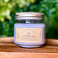 Relaxation-focused lavender self-care box with candle, shower steamer, tea sachets, and magnesium cream for stress relief