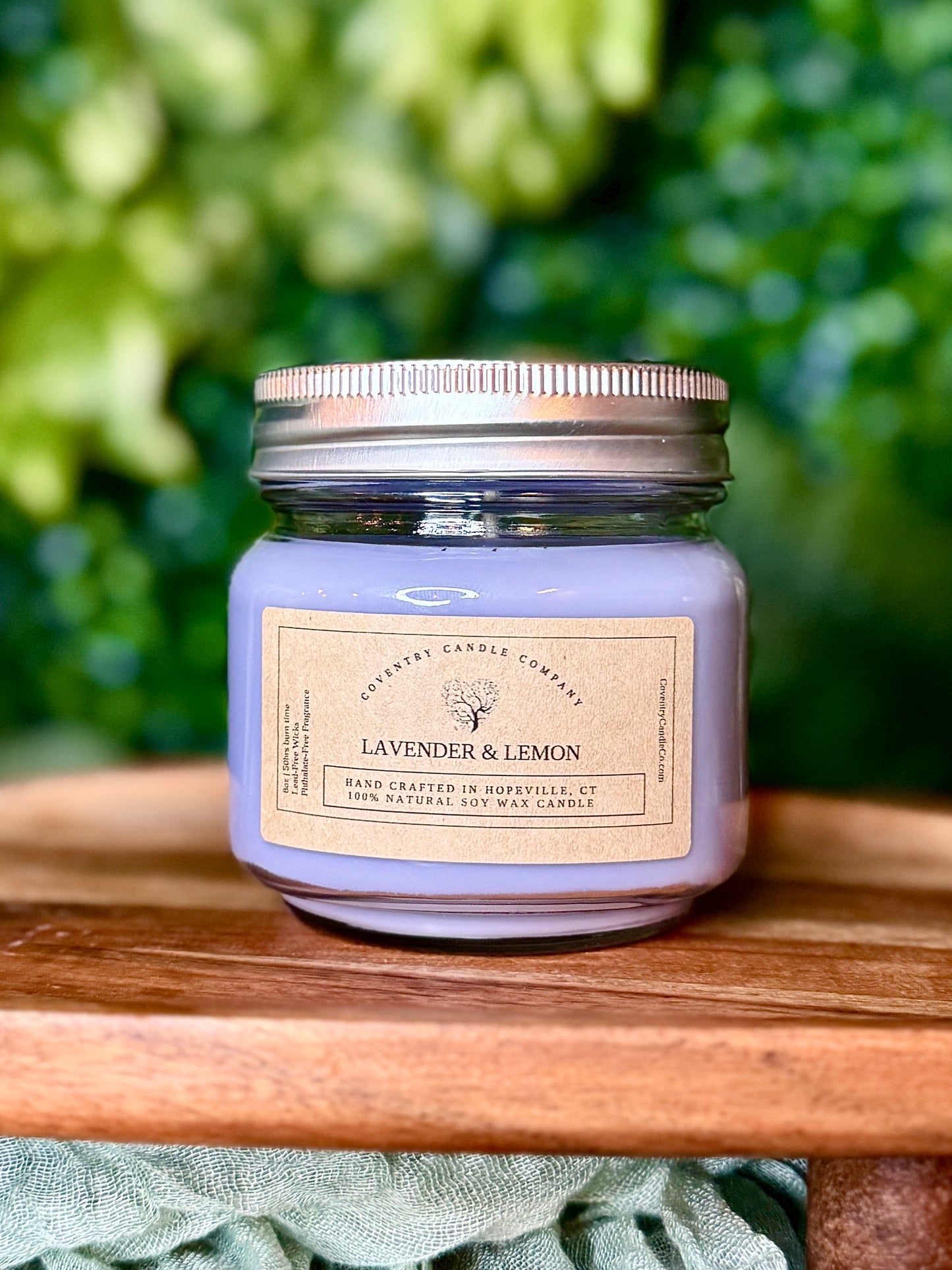 Relaxation-focused lavender self-care box with candle, shower steamer, tea sachets, and magnesium cream for stress relief